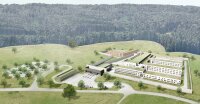 Eine 3D-Visualisierung zeigt den geplanten Neubau der Justizvollzugsanstalt: Rechts befinden sich die Gebäude der Strafhaft (weiß), anschließend die Verwaltung und Versorgungseinrichtungen, Zufahrt mit Garagengebäude und Torwache (grau), dahinter der abgetrennte Bereich der Abschiebungshaft (rot) und links die geplante Stellplatzanlage mit Parkplätzen. Eine 3D-Visualisierung zeigt den geplanten Neubau der Justizvollzugsanstalt: Rechts befinden sich die Gebäude der Strafhaft (weiß), anschließend die Verwaltung und Versorgungseinrichtungen, Zufahrt mit Garagengebäude und Torwache (grau), dahinter der abgetrennte Bereich der Abschiebungshaft (rot) und links die geplante Stellplatzanlage mit Parkplätzen.